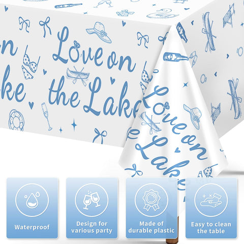 Close-up of engagement plastic tablecloth with Love on the Lake lettering
