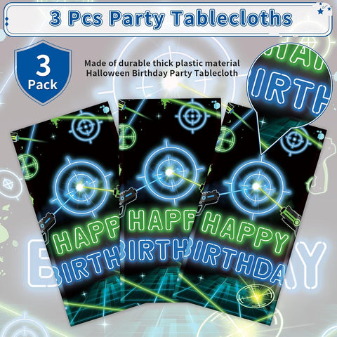 Laser tag birthday tablecloth draped on party table with gaming themed decorations