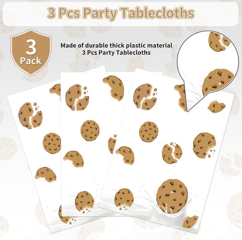 Milk and cookies tablecloth draped on party table with dessert themed decorations