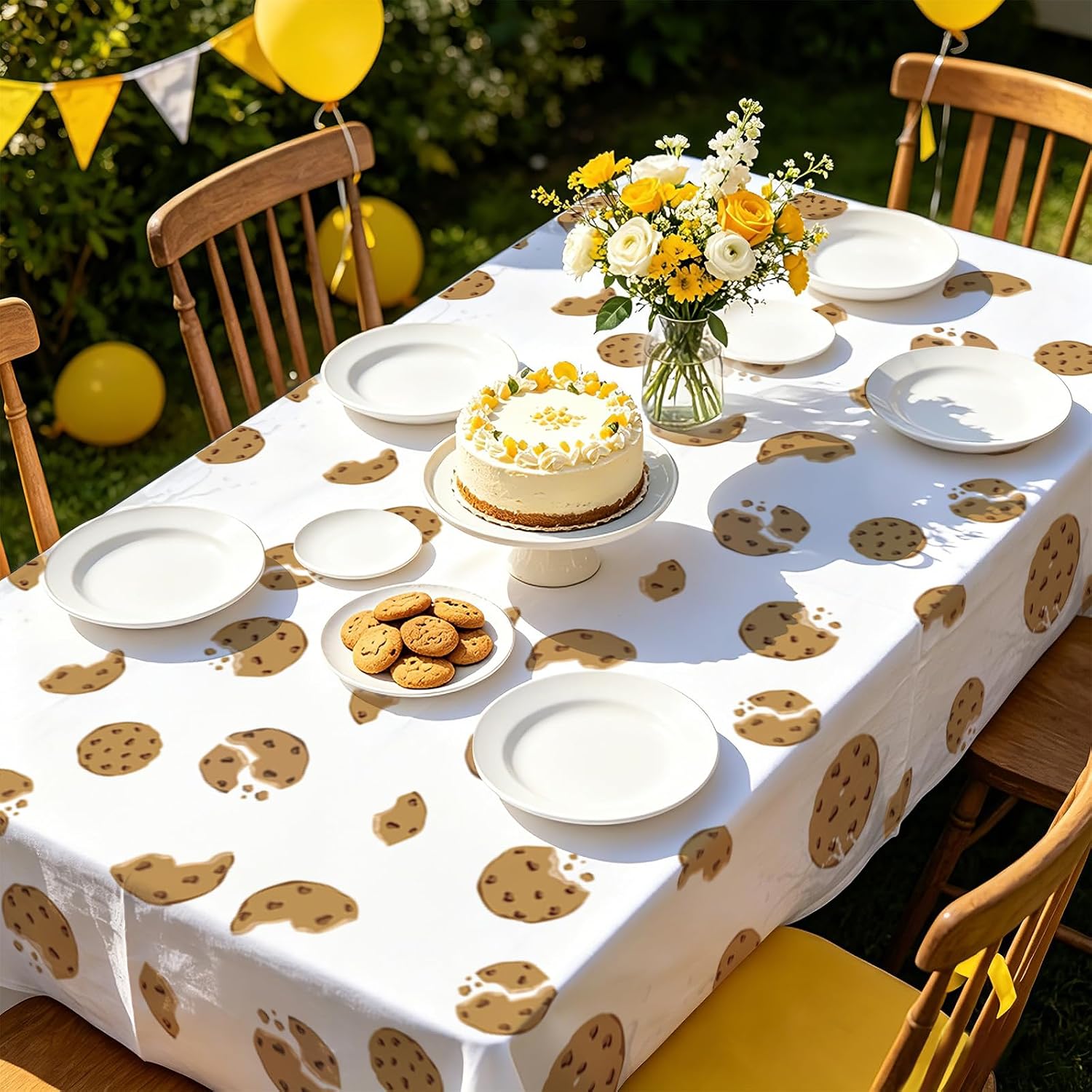 Boys girls birthday party scene with chocolate chip cookies tablecloth